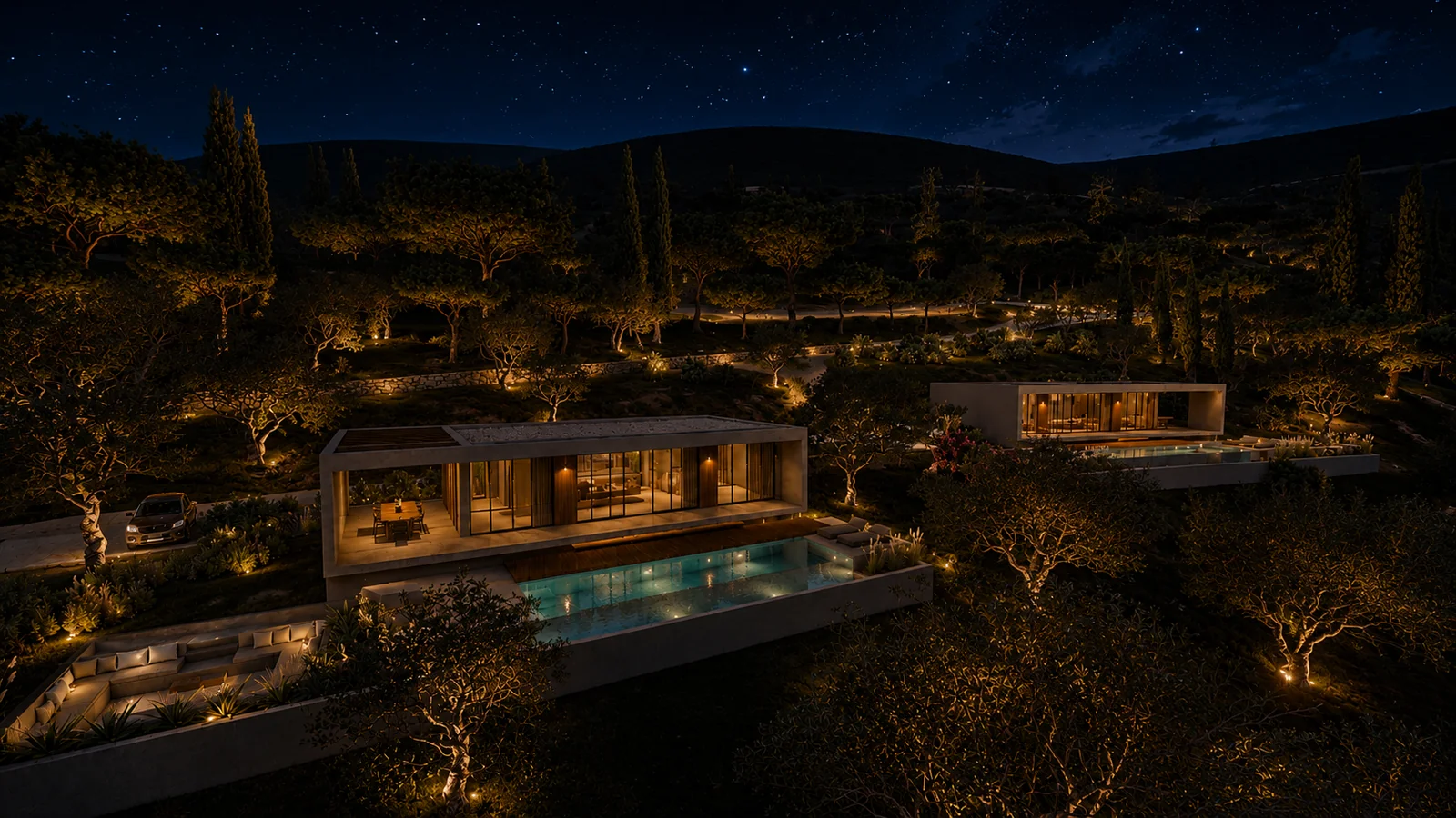 Architectural render of both villas and their illuminated terraces after dark