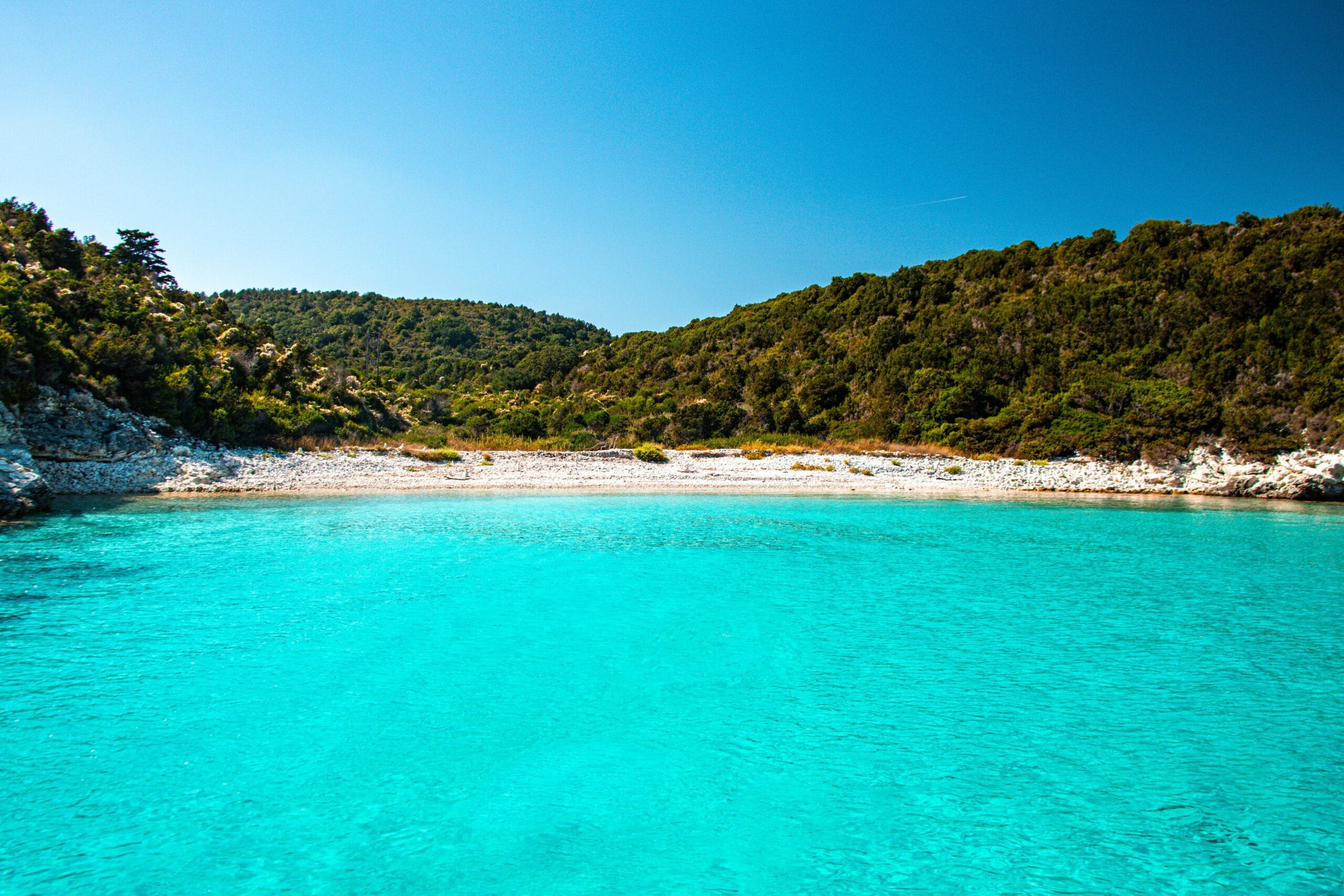 Agiofili Beach Guide 5 Rocky cove at Agiofili Beach in Lefkada with clear Ionian Sea