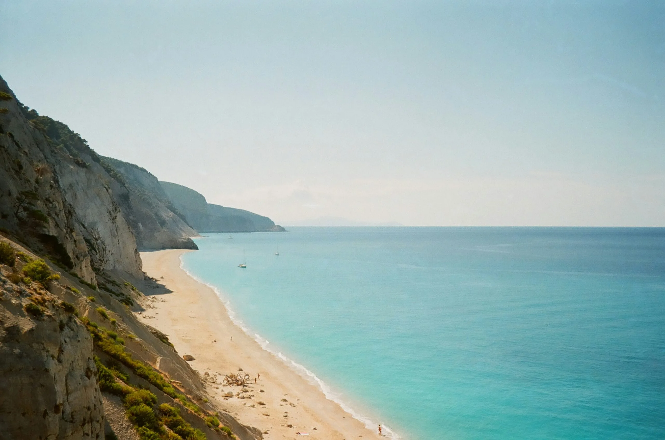 Egremni Beach beneath high limestone cliffs in Lefkada